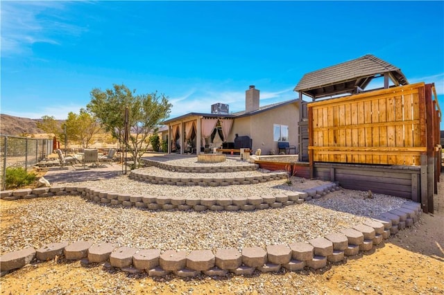 6279 Baileya Ave Unit 29, Palms, CA 92277 - view of yard with a patio