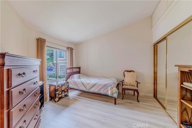 2201 Dublin Ln Unit 3, Diamond Bar, CA 91765 - bedroom with light wood finished floors, a closet, and baseboards
