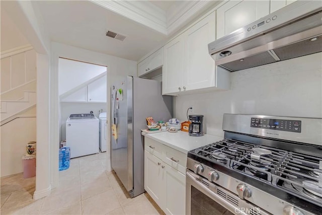 2201 Dublin Ln Unit 3, Diamond Bar, CA 91765 - kitchen featuring gas range, under cabinet range hood, white cabinetry, washing machine and dryer, and light countertops