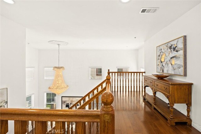 4937 Peck Rd Unit C, El Monte, CA 91732 - hall featuring wood-type flooring, recessed lighting, and an upstairs landing