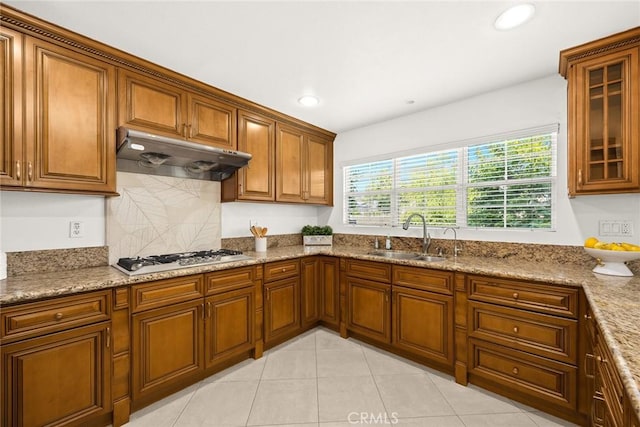 4937 Peck Rd Unit C, El Monte, CA 91732 - kitchen featuring under cabinet range hood, gas stovetop, a sink, brown cabinetry, and recessed lighting