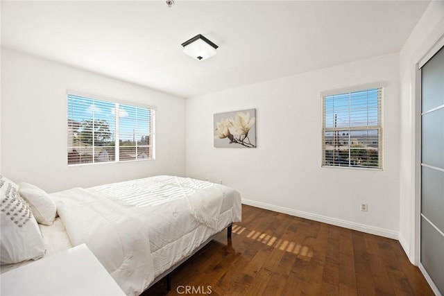 4937 Peck Rd Unit C, El Monte, CA 91732 - bedroom featuring multiple windows, wood finished floors, and baseboards
