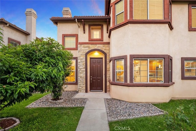 4937 Peck Rd Unit C, El Monte, CA 91732 - entrance to property with stone siding, stucco siding, and a chimney
