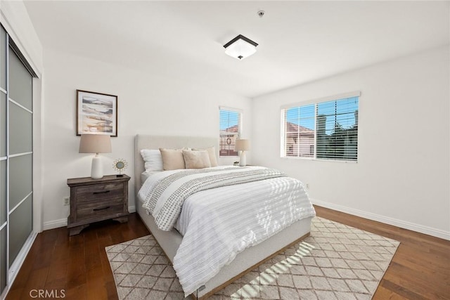 4937 Peck Rd Unit C, El Monte, CA 91732 - bedroom featuring wood finished floors, baseboards, and a closet