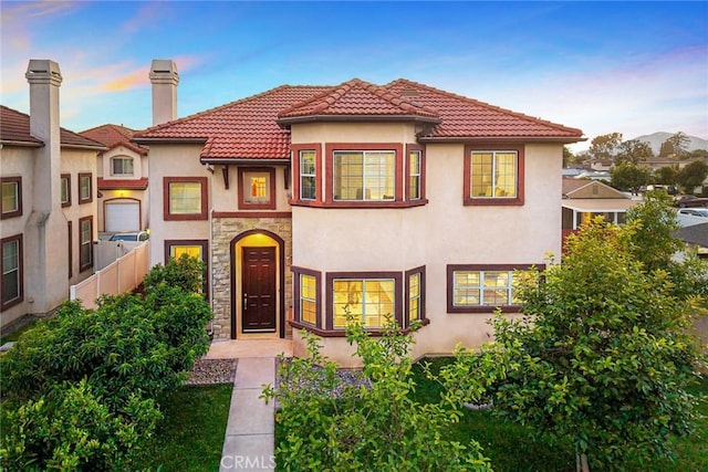 4937 Peck Rd Unit C, El Monte, CA 91732 - mediterranean / spanish home with stucco siding, stone siding, and a chimney