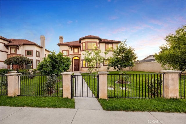 4937 Peck Rd Unit C, El Monte, CA 91732 - mediterranean / spanish home with stucco siding, a chimney, a gate, and a tile roof