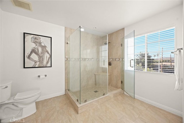 4937 Peck Rd Unit C, El Monte, CA 91732 - bathroom with baseboards, toilet, and a shower stall