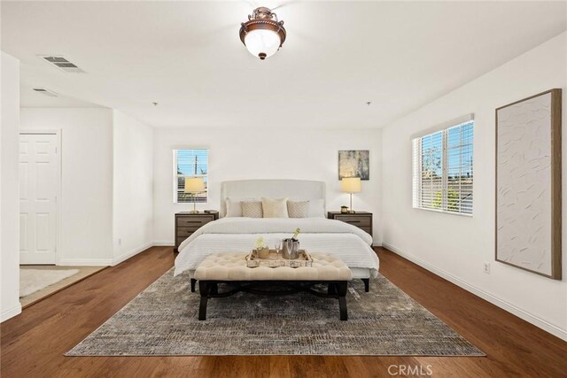 4937 Peck Rd Unit C, El Monte, CA 91732 - bedroom featuring multiple windows and wood finished floors