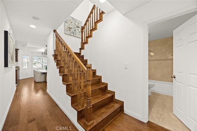 4937 Peck Rd Unit C, El Monte, CA 91732 - stairs featuring wood finished floors, baseboards, and recessed lighting