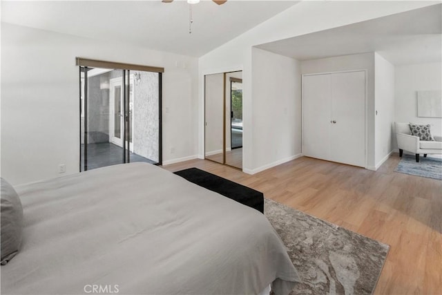 3014 California Park Dr, Chico, CA 95928 - bedroom with wood finished floors, vaulted ceiling, access to exterior, baseboards, and a ceiling fan