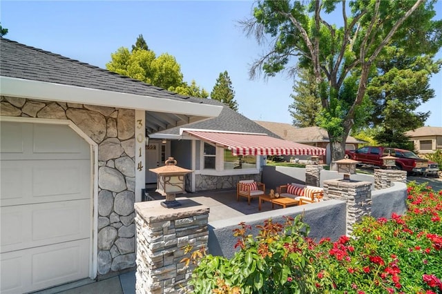 3014 California Park Dr, Chico, CA 95928 - view of patio with outdoor lounge area and a garage
