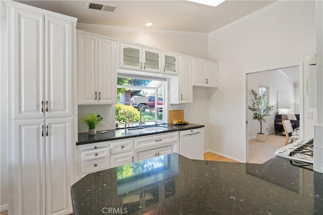 3014 California Park Dr, Chico, CA 95928 - kitchen with a sink, dishwasher, white cabinets, crown molding, and lofted ceiling