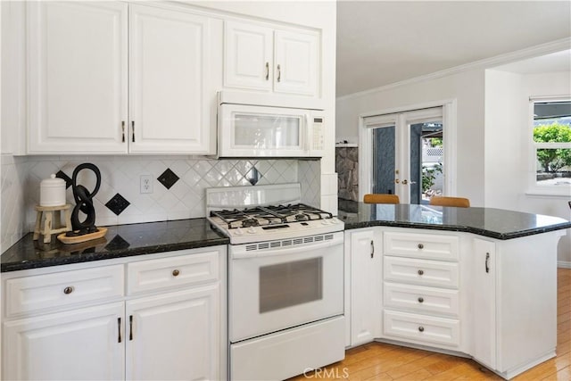 3014 California Park Dr, Chico, CA 95928 - kitchen with white appliances, a peninsula, crown molding, white cabinetry, and light wood finished floors