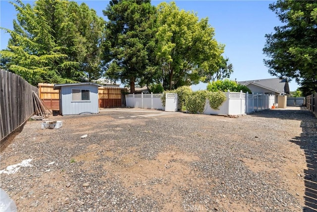 3014 California Park Dr, Chico, CA 95928 - fenced backyard featuring a storage shed