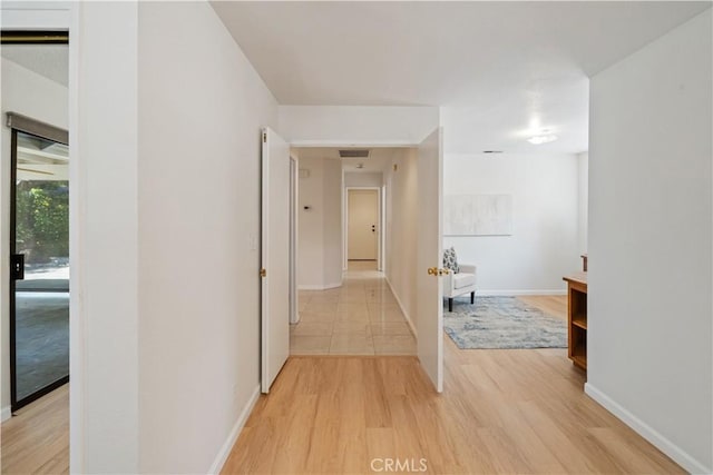 3014 California Park Dr, Chico, CA 95928 - hallway featuring light wood-type flooring and baseboards