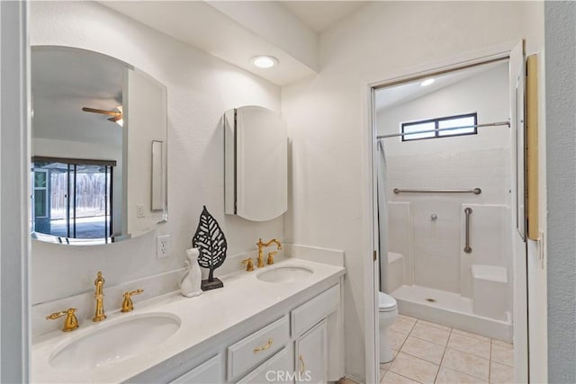 3014 California Park Dr, Chico, CA 95928 - bathroom featuring toilet, plenty of natural light, a shower with curtain, and double vanity