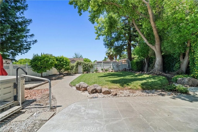 3014 California Park Dr, Chico, CA 95928 - fenced backyard featuring a patio area