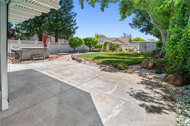 3014 California Park Dr, Chico, CA 95928 - fenced backyard with a patio area and a hot tub