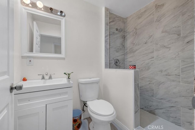 7701 Baird Ave, Reseda, CA 91335 - bathroom featuring vanity, walk in shower, and toilet