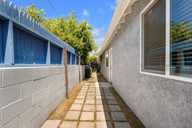 7701 Baird Ave, Reseda, CA 91335 - view of side of property featuring stucco siding