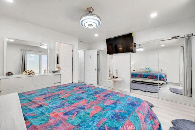 7701 Baird Ave, Reseda, CA 91335 - bedroom featuring recessed lighting and wood finished floors
