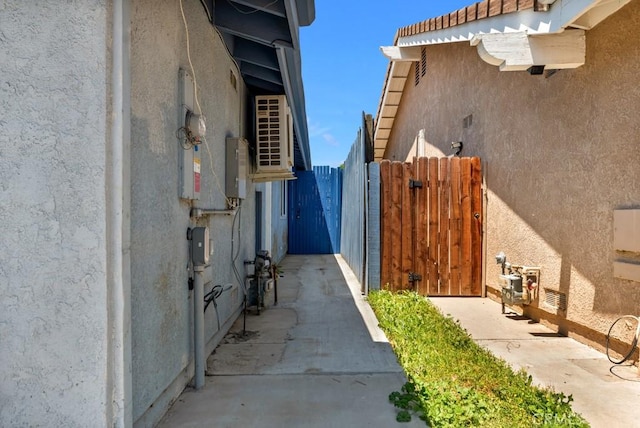 7701 Baird Ave, Reseda, CA 91335 - view of property exterior with stucco siding, a gate, and a tiled roof