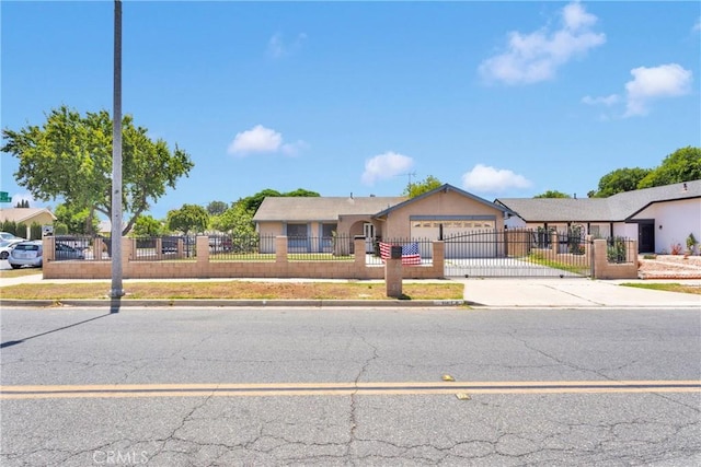9820 Mandalay Ct, Riverside, CA 92503 - ranch-style home with an attached garage, concrete driveway, a fenced front yard, and stucco siding