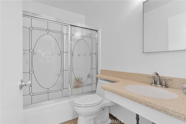 9820 Mandalay Ct, Riverside, CA 92503 - full bath with a sink, shower / bath combination with glass door, and toilet