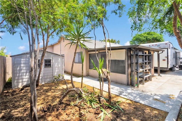 9820 Mandalay Ct, Riverside, CA 92503 - back of property featuring a patio and a sunroom