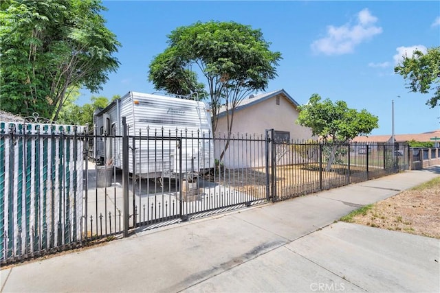 9820 Mandalay Ct, Riverside, CA 92503 - gate featuring a fenced front yard