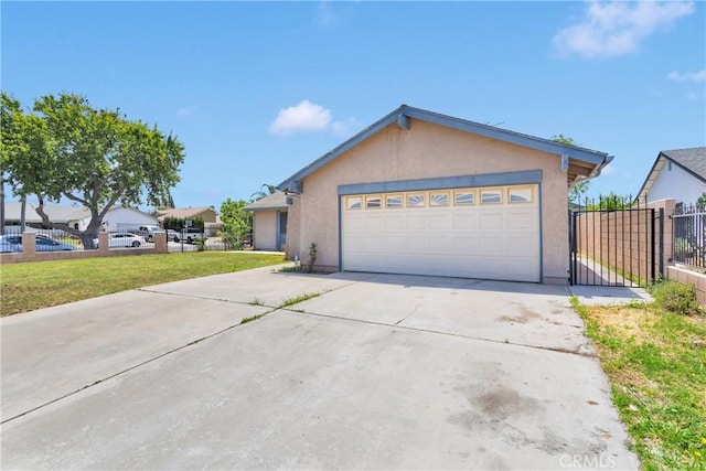 9820 Mandalay Ct, Riverside, CA 92503 - ranch-style home with stucco siding, driveway, an attached garage, and a gate