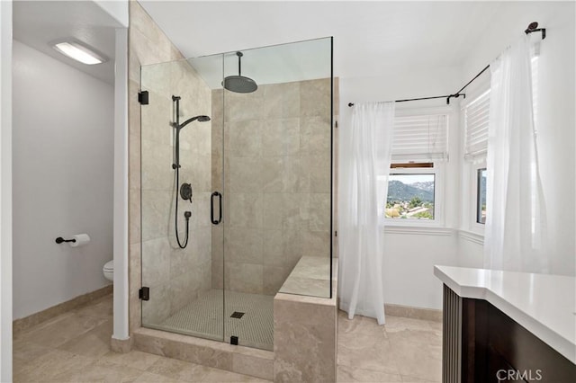 32070 Corte Bonilio, Temecula, CA 92592 - bathroom featuring a stall shower, vanity, and tile patterned floors