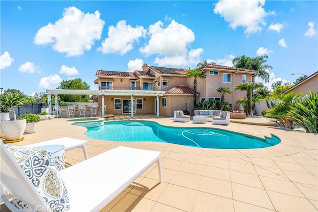 32070 Corte Bonilio, Temecula, CA 92592 - view of swimming pool featuring an outdoor living space with a fire pit, a patio area, and a pool with connected hot tub