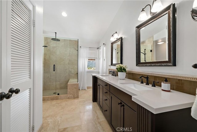 32070 Corte Bonilio, Temecula, CA 92592 - full bathroom featuring double vanity, a stall shower, decorative backsplash, and recessed lighting
