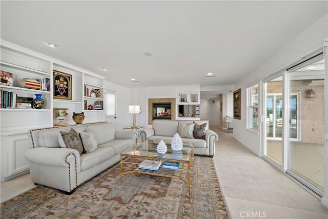 32070 Corte Bonilio, Temecula, CA 92592 - living area featuring light tile patterned floors, recessed lighting, and built in shelves