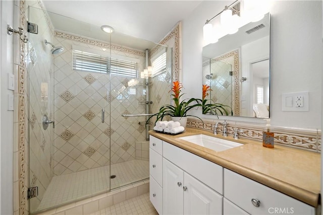 32070 Corte Bonilio, Temecula, CA 92592 - full bath featuring vanity, a stall shower, and tile patterned flooring