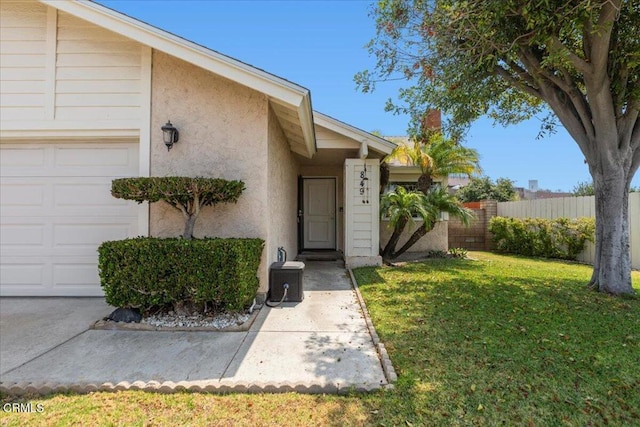 849 Plaza Cuernavaca Way, San Diego, CA 92114 - property entrance with stucco siding and a garage
