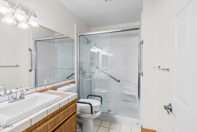 849 Plaza Cuernavaca Way, San Diego, CA 92114 - full bath featuring tile patterned floors, a shower stall, and vanity