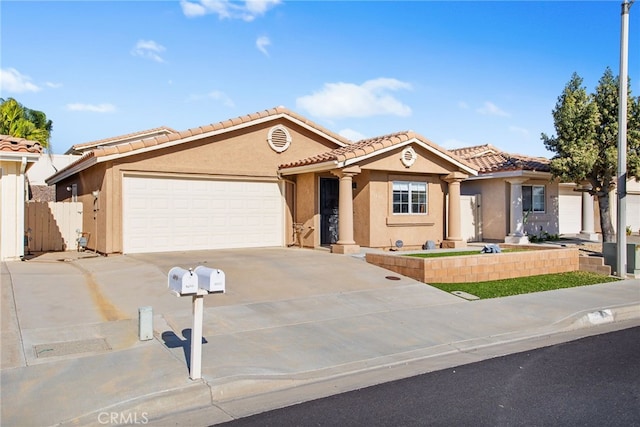 28162 Bavaria Dr, Menifee, CA 92585 - mediterranean / spanish home with stucco siding, an attached garage, a tiled roof, and concrete driveway
