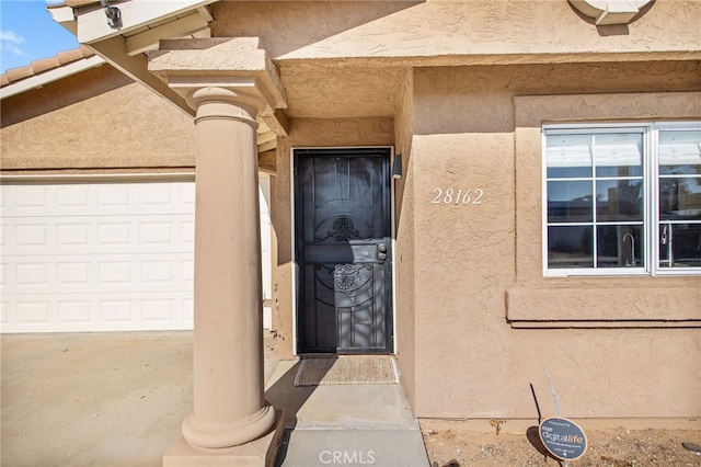 28162 Bavaria Dr, Menifee, CA 92585 - view of exterior entry featuring stucco siding