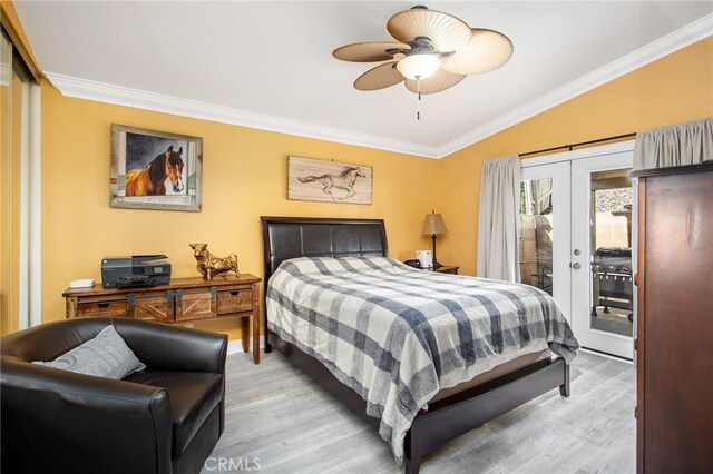 28162 Bavaria Dr, Menifee, CA 92585 - bedroom with access to exterior, light wood-style flooring, ornamental molding, vaulted ceiling, and french doors