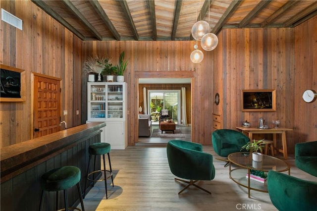 33252 Big Sur St, Dana Point, CA 92629 - living area featuring wooden walls, a wooden ceiling with exposed beams, and wood finished floors