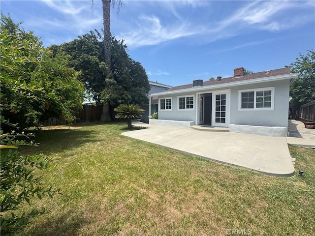 23308 Friar St, Woodland Hills, CA 91367 - rear view of property with stucco siding, a patio, and a chimney