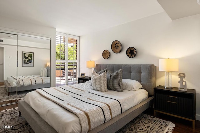 4000 Via Marisol 103, Los Angeles, CA 90042 - bedroom featuring wood finished floors and a closet