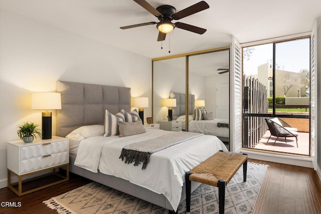 4000 Via Marisol 103, Los Angeles, CA 90042 - bedroom featuring wood finished floors, access to outside, a closet, and a ceiling fan