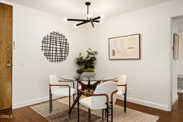 4000 Via Marisol 103, Los Angeles, CA 90042 - dining room with a chandelier and wood finished floors