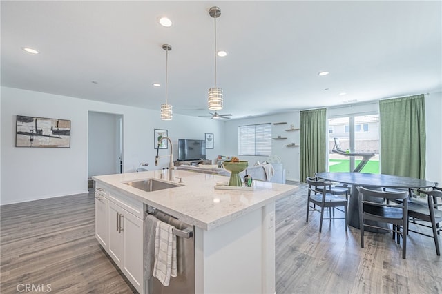 6118 W W Ave J9, Lancaster, CA 93536 - kitchen with a sink, dishwasher, hanging light fixtures, open floor plan, and light wood-style flooring