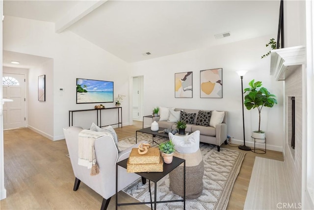 4519 Darien St, Torrance, CA 90503 - living room with light wood-style floors and a fireplace with flush hearth
