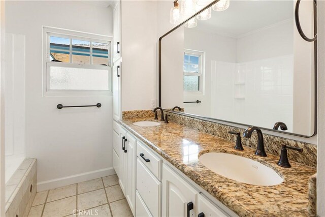 4519 Darien St, Torrance, CA 90503 - bathroom featuring plenty of natural light, double vanity, ornamental molding, and tile patterned flooring