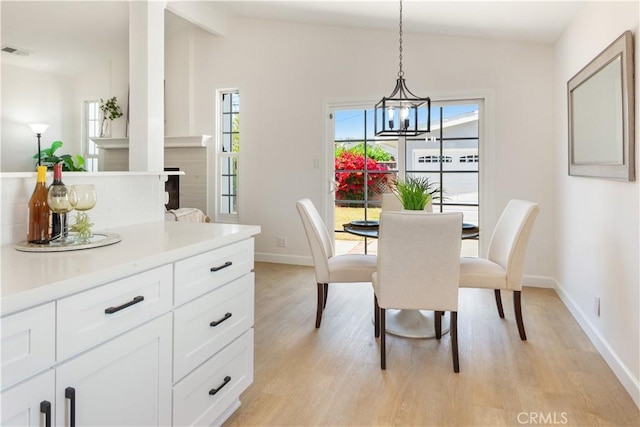 4519 Darien St, Torrance, CA 90503 - dining room with light wood-style flooring and a chandelier